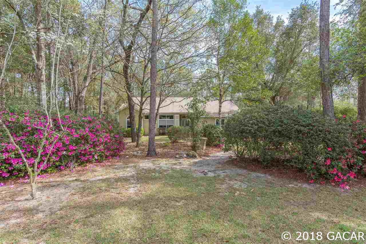 10107 Southwest 75th Way Gainesville, FL 32608 - Photo 3 of 23 Mature Landscaping in front yard