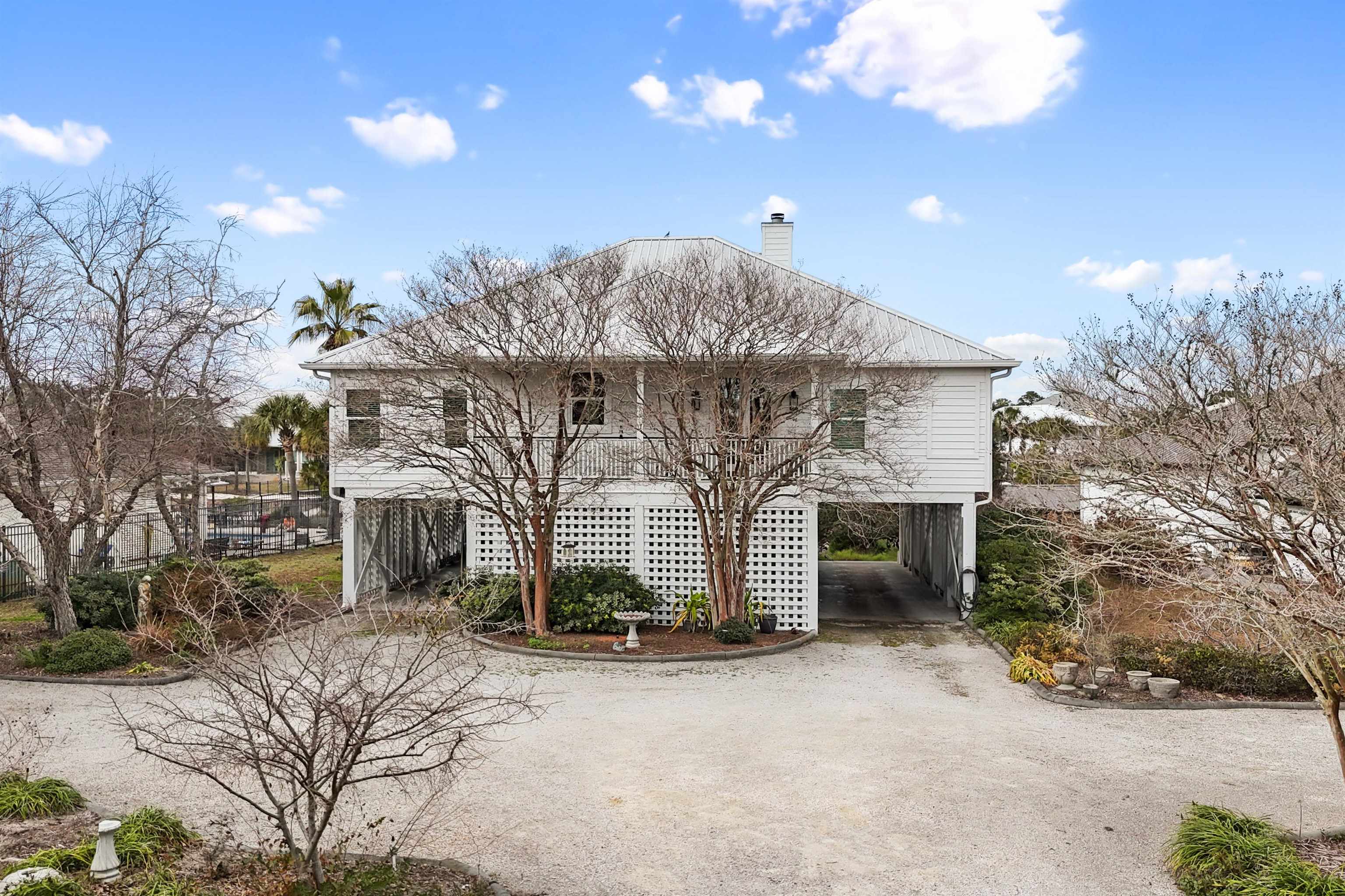 31835 River Road Orange Beach, AL 36561 - Photo 2 of 55 Front Of Structure