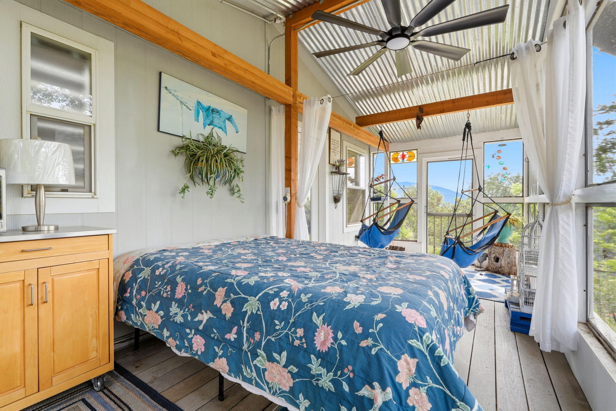 45241 Crest Lane Three Rivers, CA 93271 - Photo 16 of 63 screened in porch with hammocks and a bed