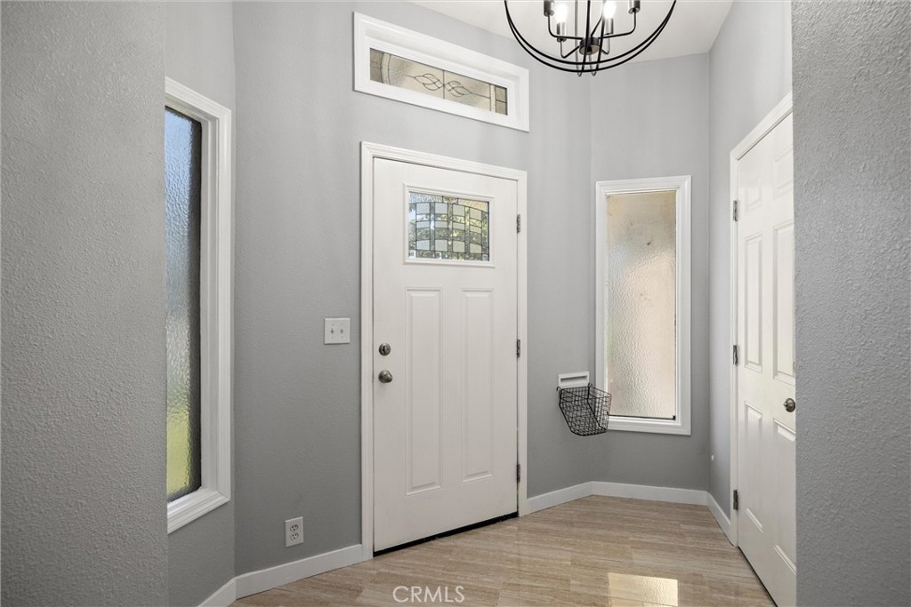 1 Parkhurst Street Chico, CA 95928 - Photo 2 of 52 a view of an entryway with wooden floor
