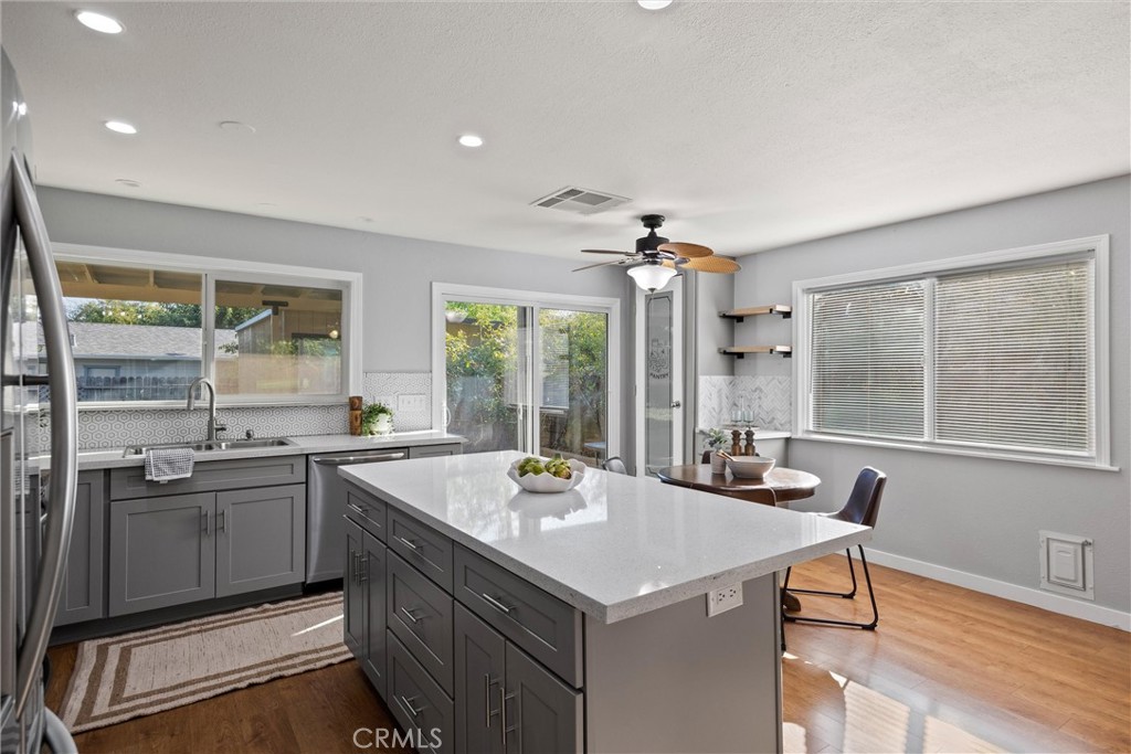 1 Parkhurst Street Chico, CA 95928 - Photo 9 of 52 a kitchen with a sink stove and cabinets