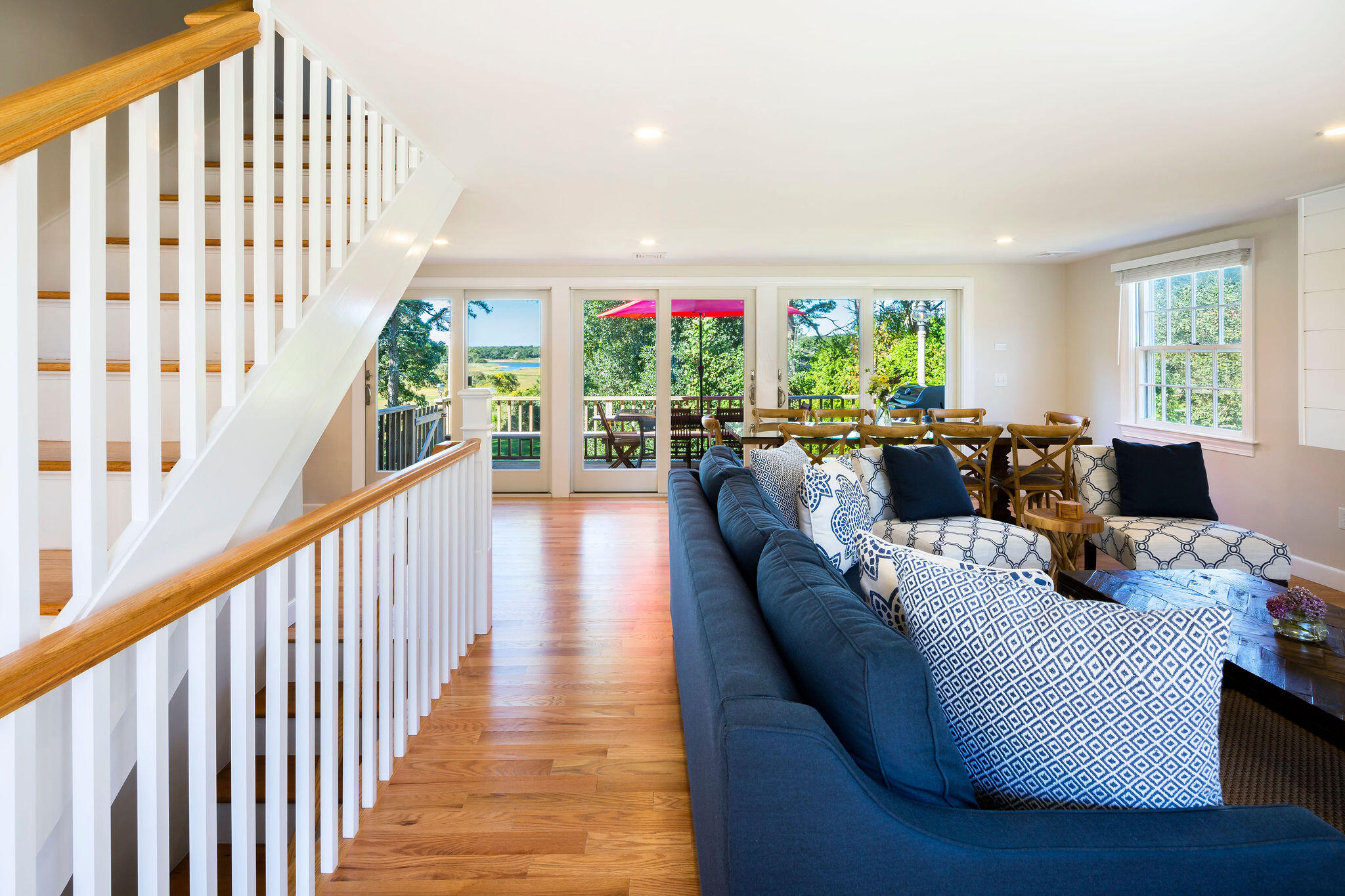 20 Hardings Beach Road Chatham, MA 02633 - Photo 3 of 20 a living room with furniture fireplace and large windows