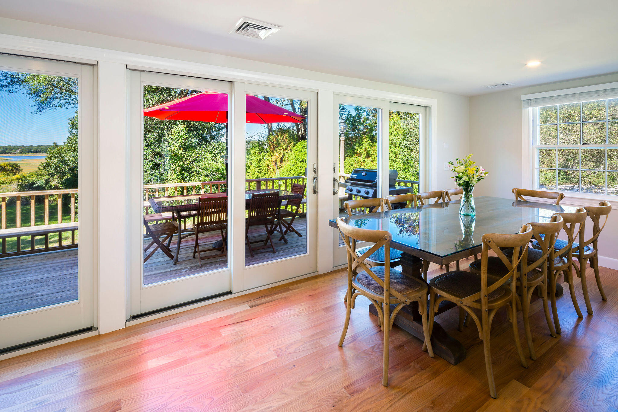 20 Hardings Beach Road Chatham, MA 02633 - Photo 4 of 20 a view of a dining room with furniture window and wooden floor