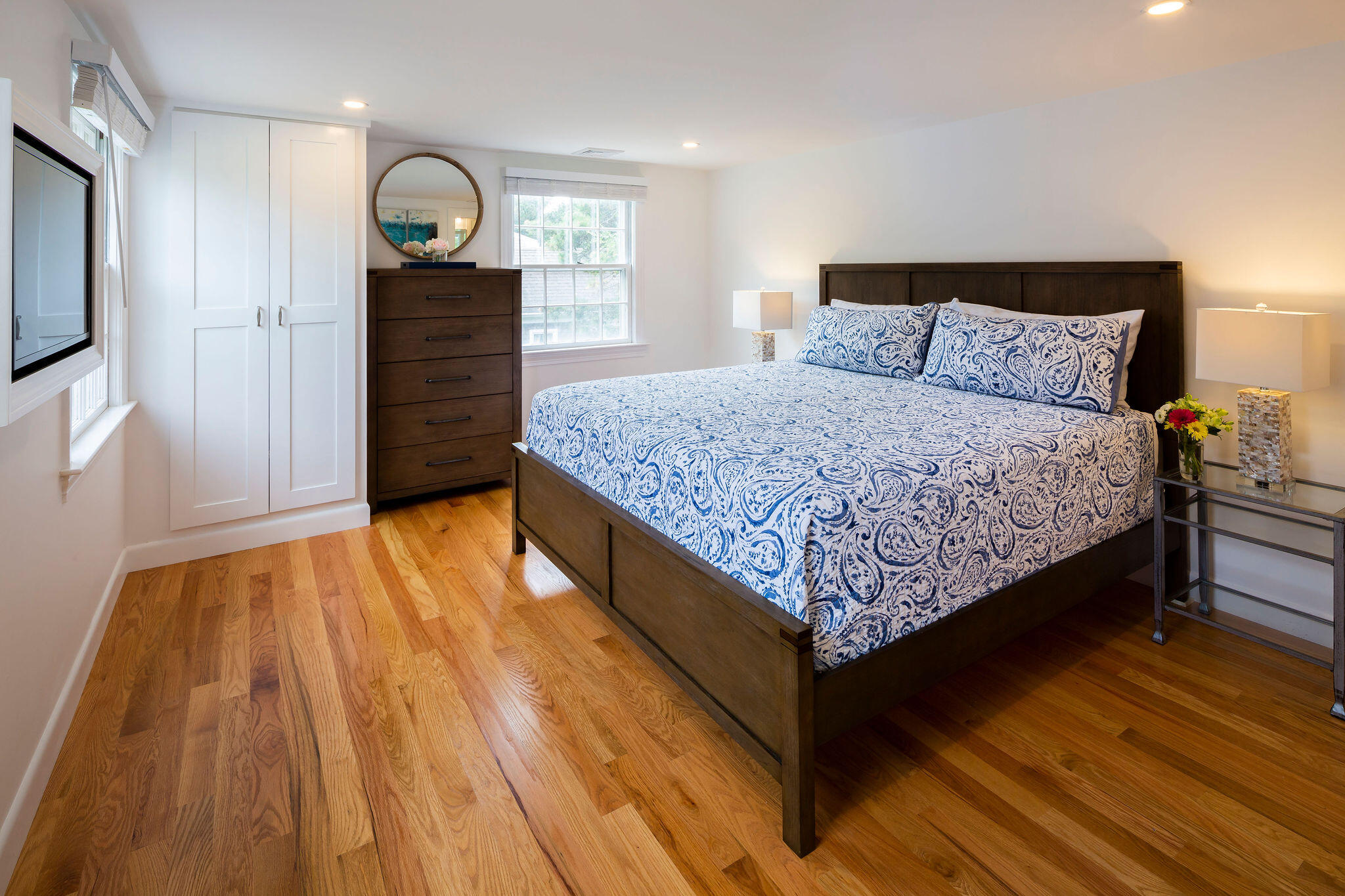 20 Hardings Beach Road Chatham, MA 02633 - Photo 8 of 20 a spacious bedroom with a bed and a dresser