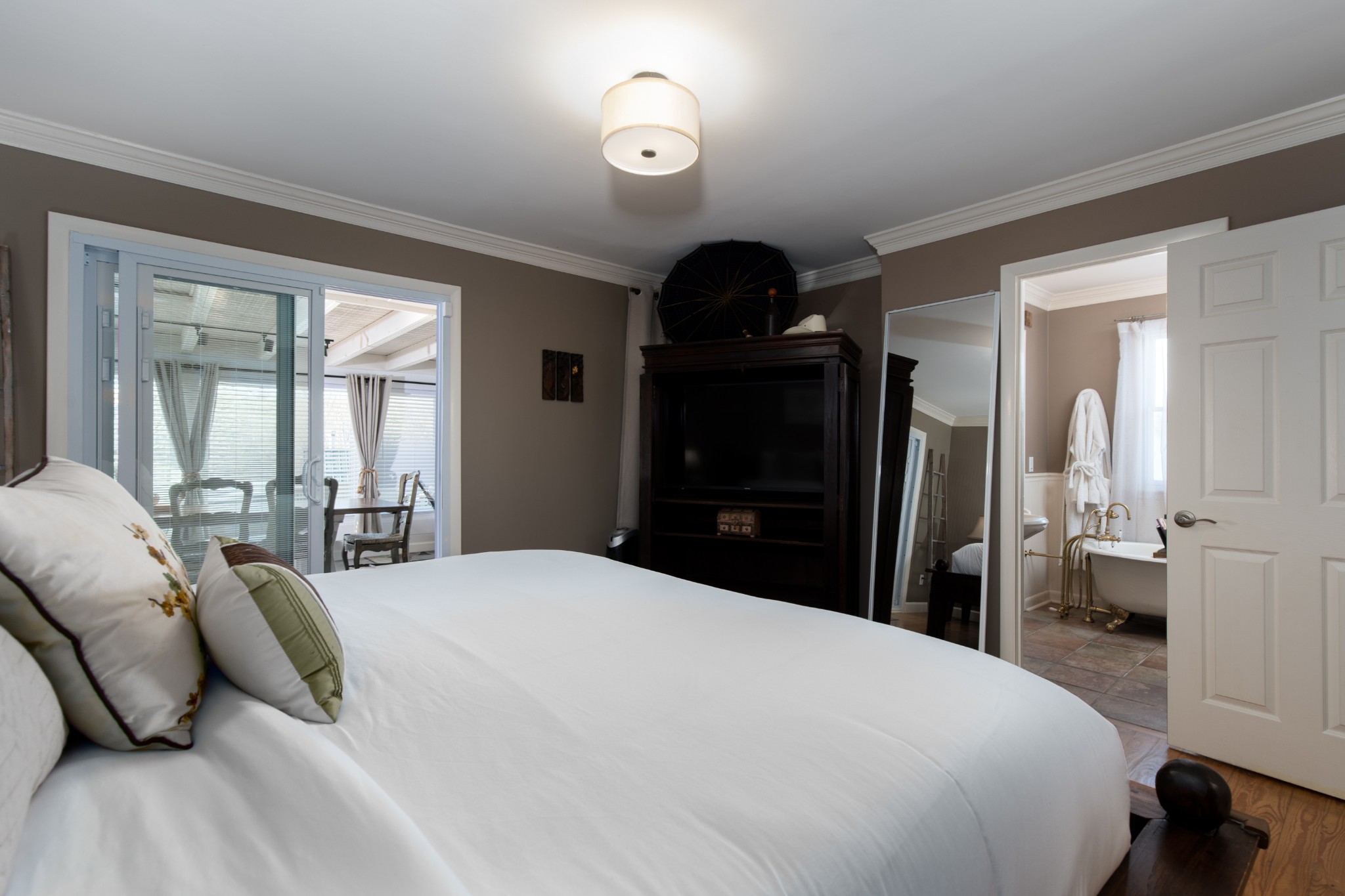 7515 Pewitt Road Franklin, TN 37064 - Photo 31 of 96 a bedroom with a bed and a large mirror