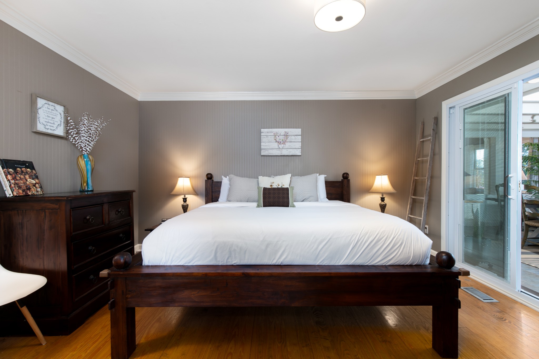 7515 Pewitt Road Franklin, TN 37064 - Photo 35 of 96 a bedroom with a bed and a lamp on table