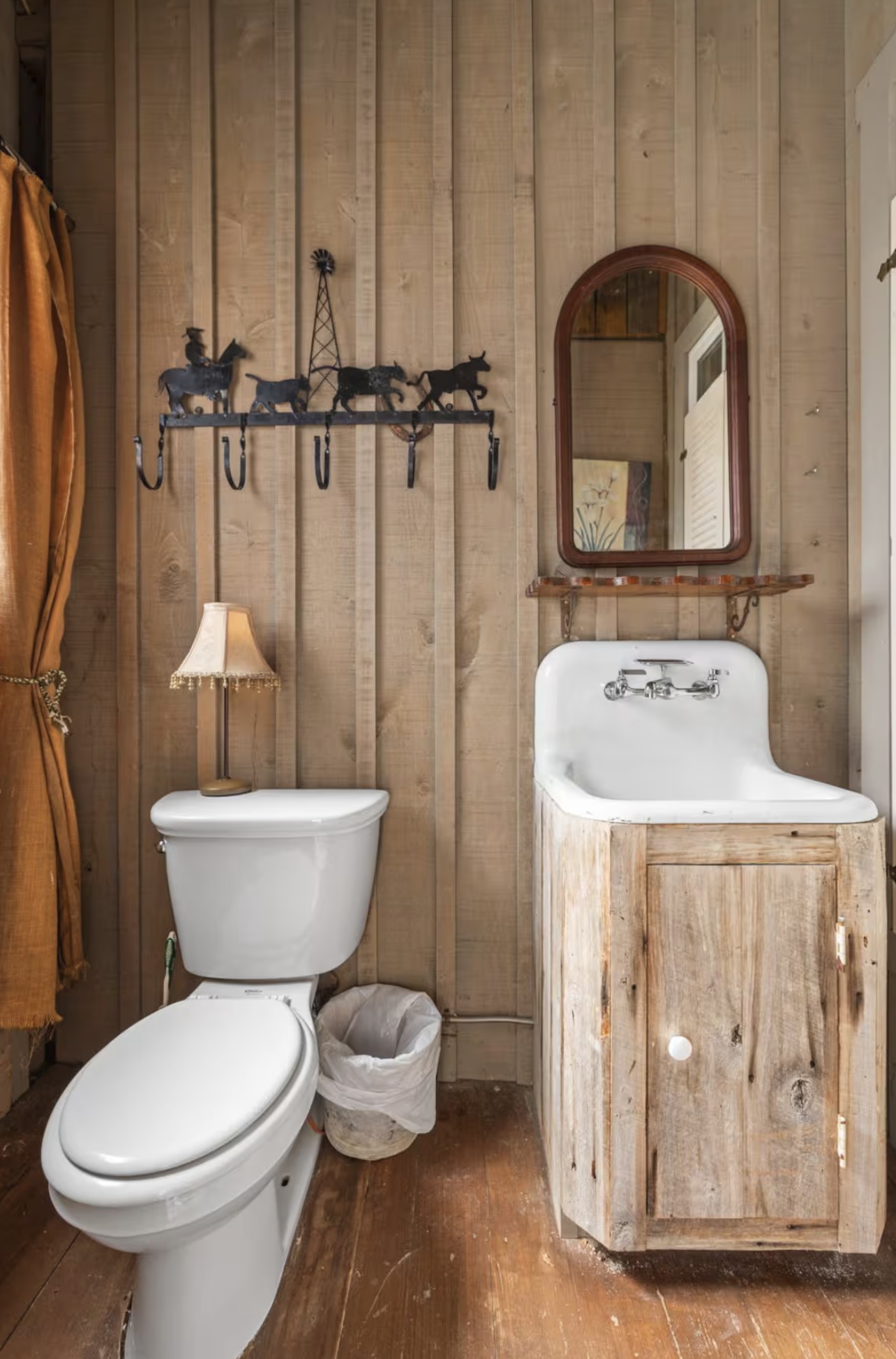7515 Pewitt Road Franklin, TN 37064 - Photo 86 of 96 a bathroom with a toilet sink and mirror
