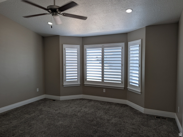 171 South Mustang Road East Grantsville, UT 84029 - Photo 13 of 41 Bay window with custom plantation shutters