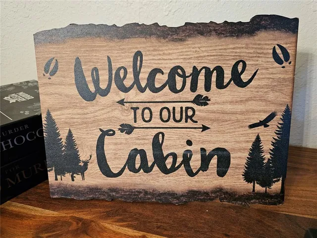 a sign broad on a brick wall