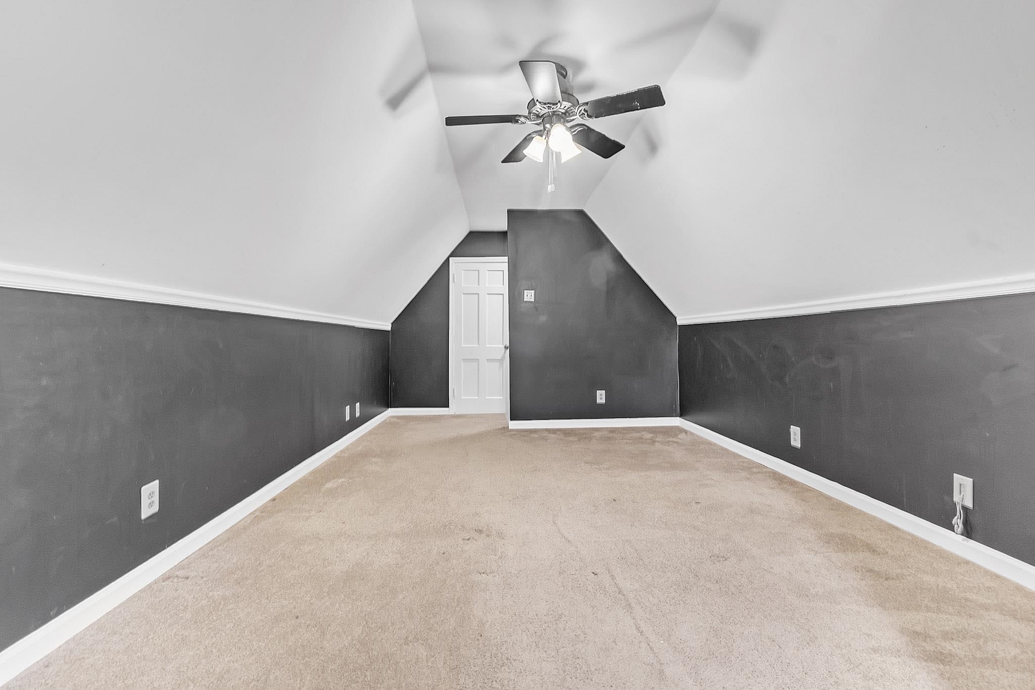 4788 Shadow View Lane Bartlett, TN 38002 - Photo 20 of 33 Bonus room featuring a ceiling fan, carpet, vaulted ceiling, and baseboards