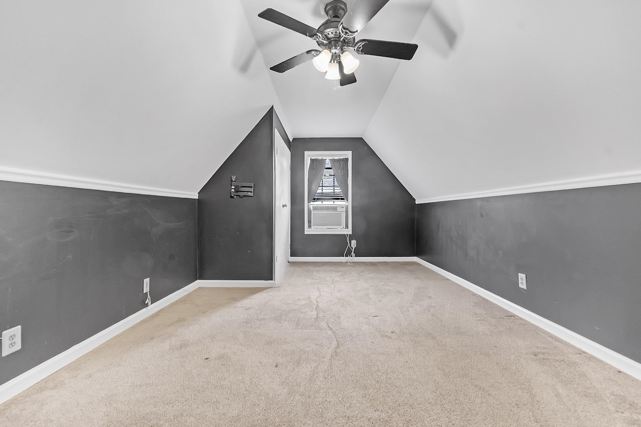 4788 Shadow View Lane Bartlett, TN 38002 - Photo 21 of 33 Bonus room featuring baseboards, carpet, a ceiling fan, lofted ceiling, and cooling unit