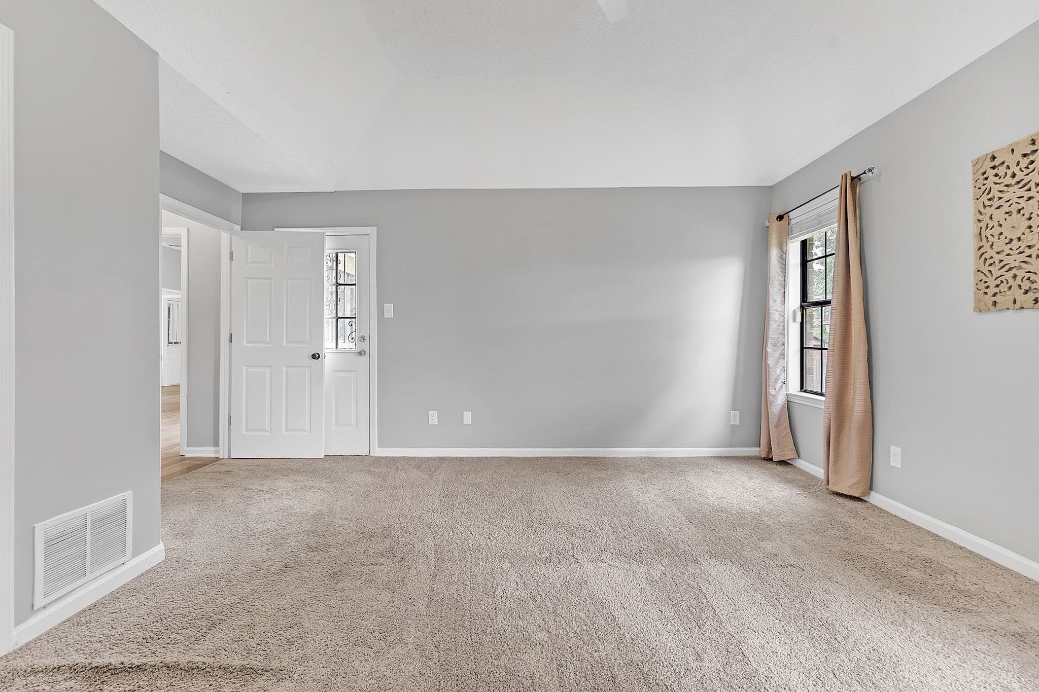4788 Shadow View Lane Bartlett, TN 38002 - Photo 23 of 33 Spare room with healthy amount of natural light, carpet floors, and baseboards