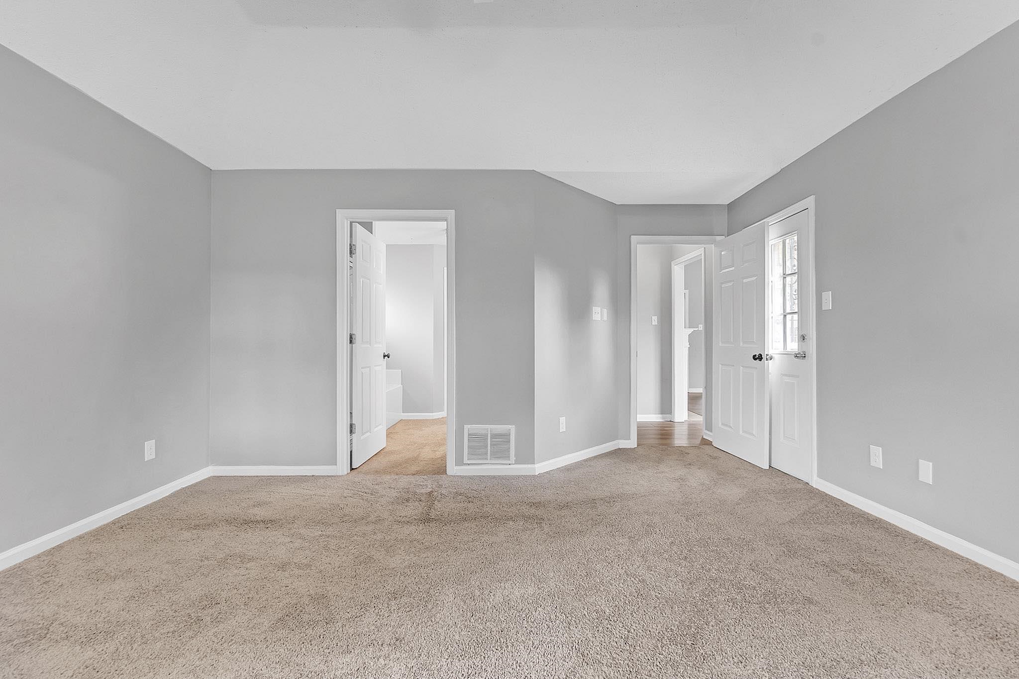 4788 Shadow View Lane Bartlett, TN 38002 - Photo 24 of 33 Empty room featuring carpet and baseboards