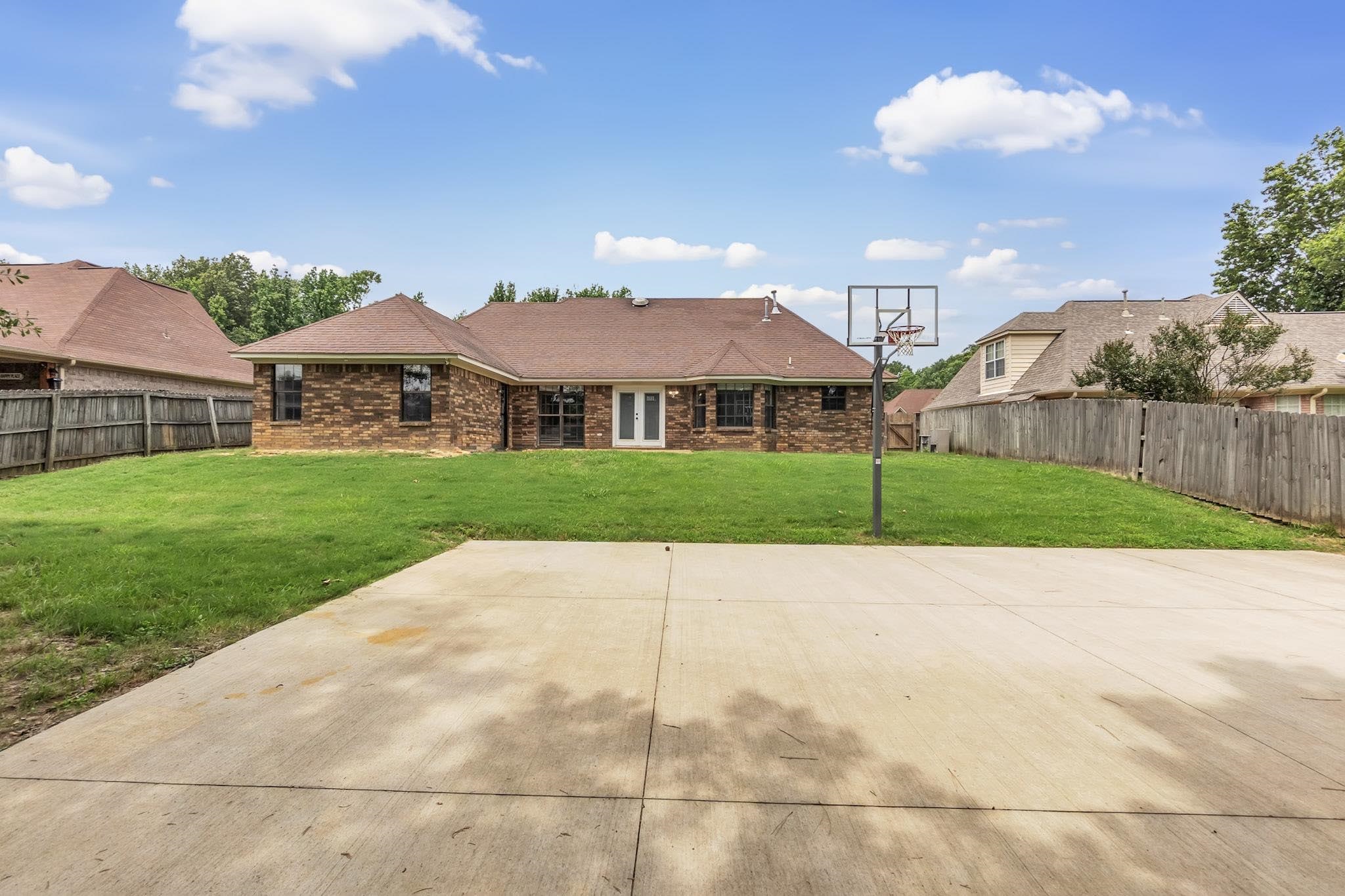 4788 Shadow View Lane Bartlett, TN 38002 - Photo 28 of 33 Rear view of house with brick siding