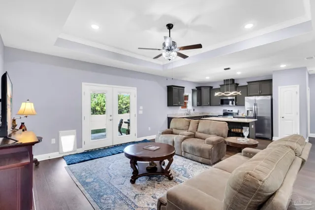 a view of kitchen sink and wooden floor