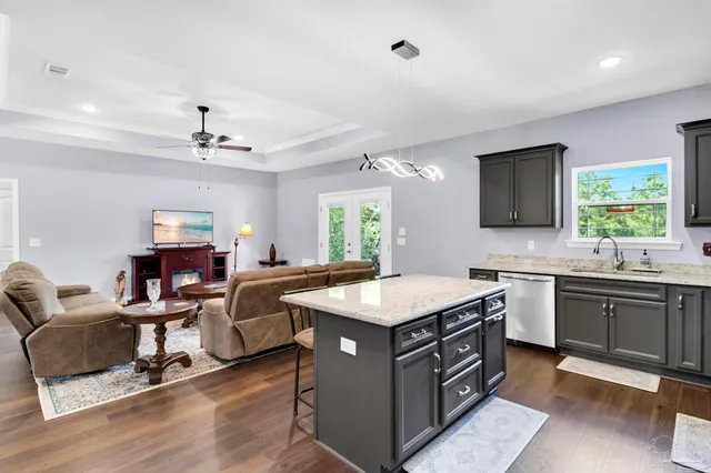 a bedroom with furniture and a fireplace