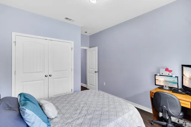 a view of a swimming pool with a lounge chair