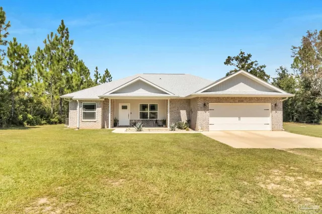 a view of a house with swimming pool