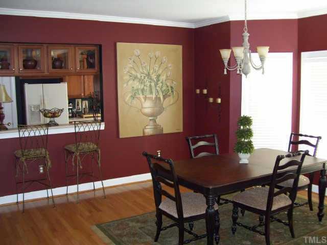 7520 Lead Mine Road Raleigh, NC 27615 - Photo 4 of 10 a view of a dining room with furniture and window