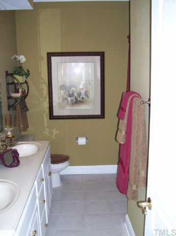 7520 Lead Mine Road Raleigh, NC 27615 - Photo 10 of 10 a bathroom with a sink and a mirror