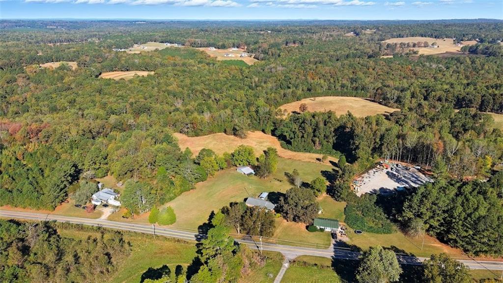 1075 Davis Road Carrollton, GA 30116 - Photo 22 of 23 an aerial view of a house with a yard