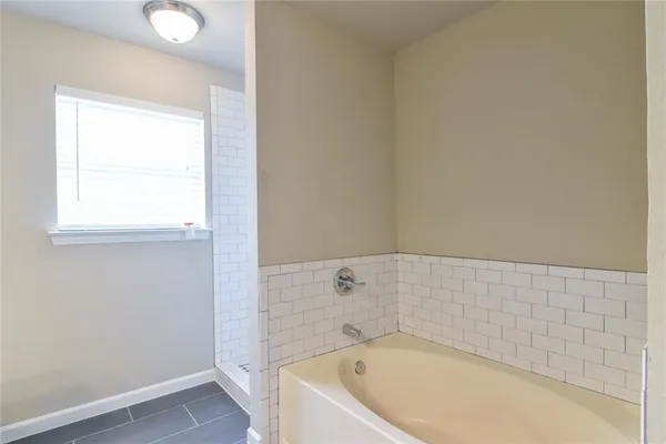 a bathroom with a bathtub