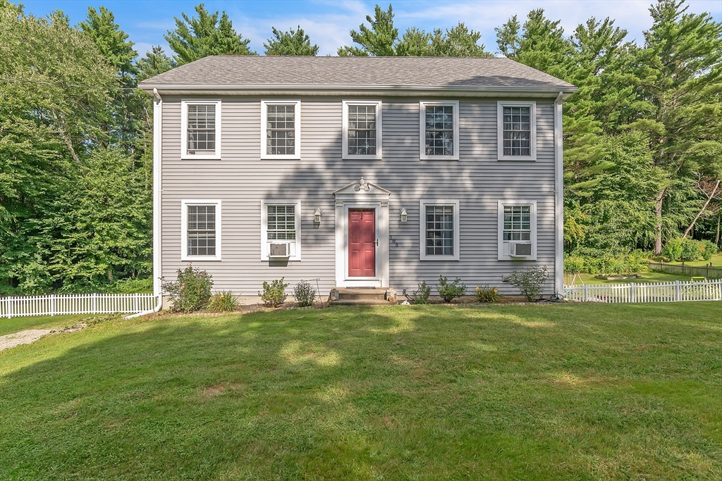 185 Bemis Road Warren, MA 01585 - Photo 1 of 36 a front view of a house with a yard