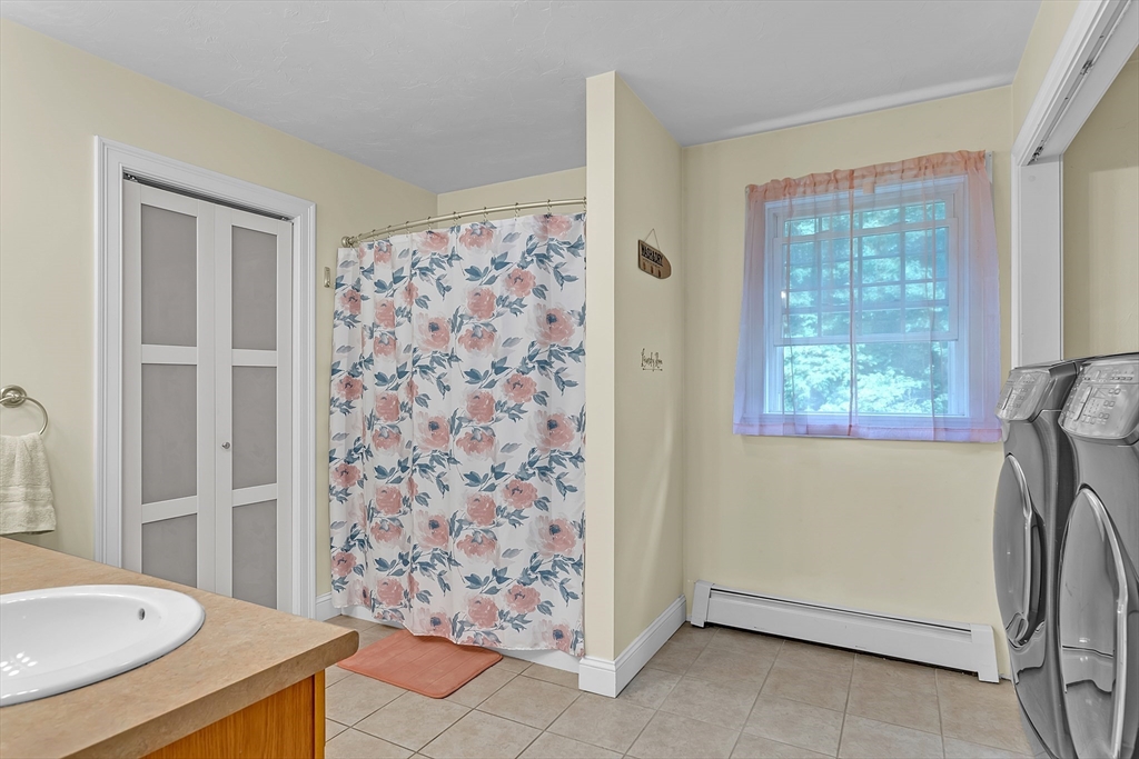 185 Bemis Road Warren, MA 01585 - Photo 25 of 36 a bathroom with a sink and a shower