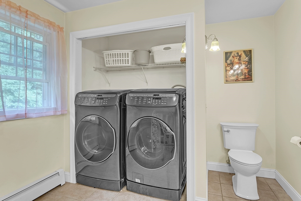 185 Bemis Road Warren, MA 01585 - Photo 27 of 36 a utility room with dryer and washer