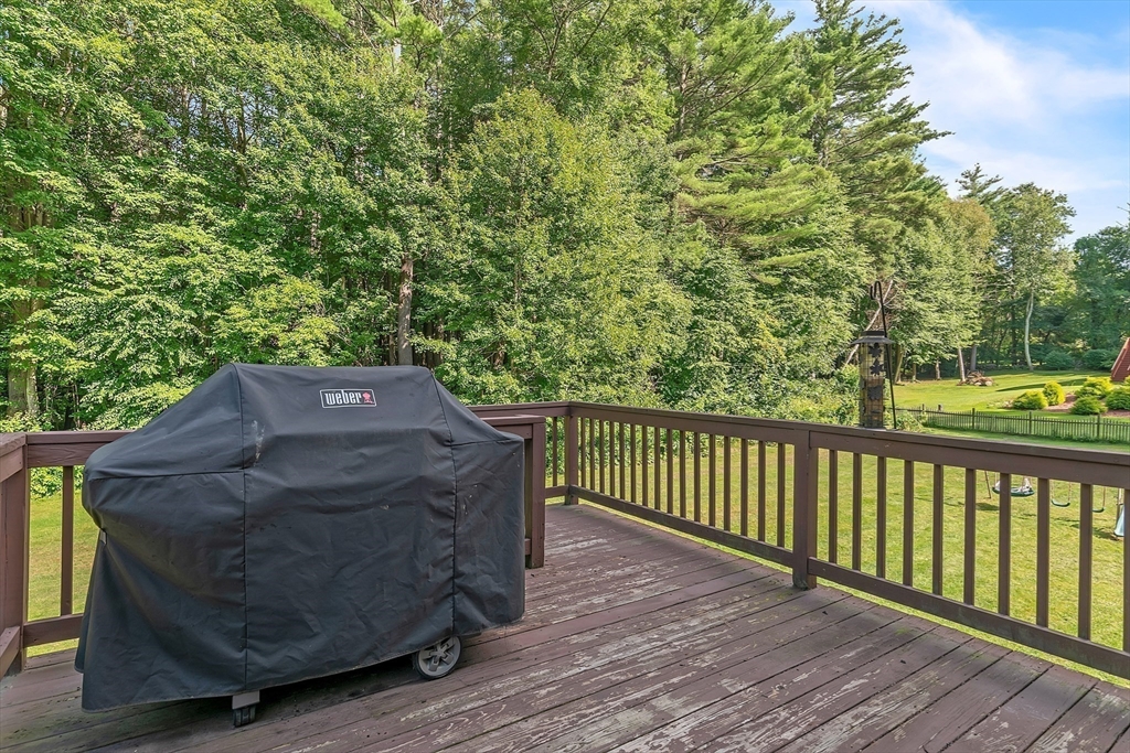 185 Bemis Road Warren, MA 01585 - Photo 30 of 36 a balcony with wooden floor and fence