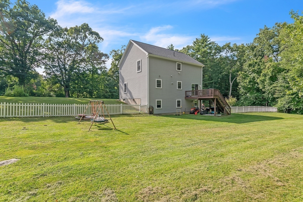 185 Bemis Road Warren, MA 01585 - Photo 31 of 36 a view of a swimming pool with a house in the background