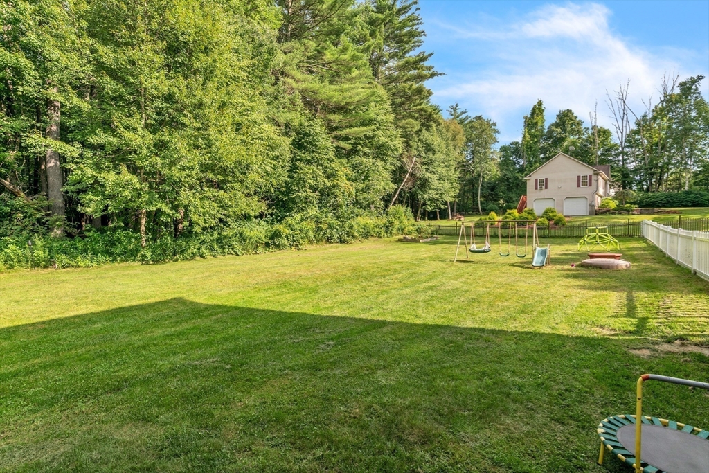 185 Bemis Road Warren, MA 01585 - Photo 33 of 36 a swimming pool with trees in the background