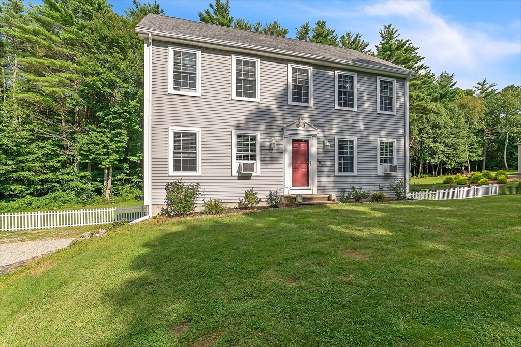 185 Bemis Road Warren, MA 01585 - Photo 35 of 36 front view of a house with a yard