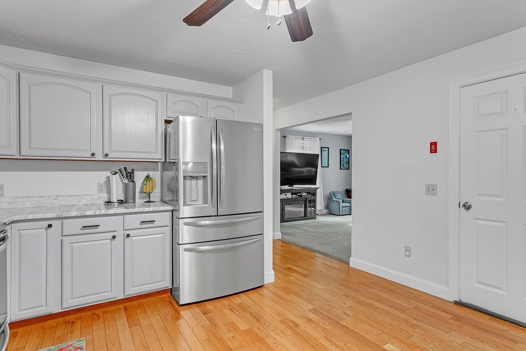 185 Bemis Road Warren, MA 01585 - Photo 5 of 36 a kitchen with granite countertop a refrigerator and a sink