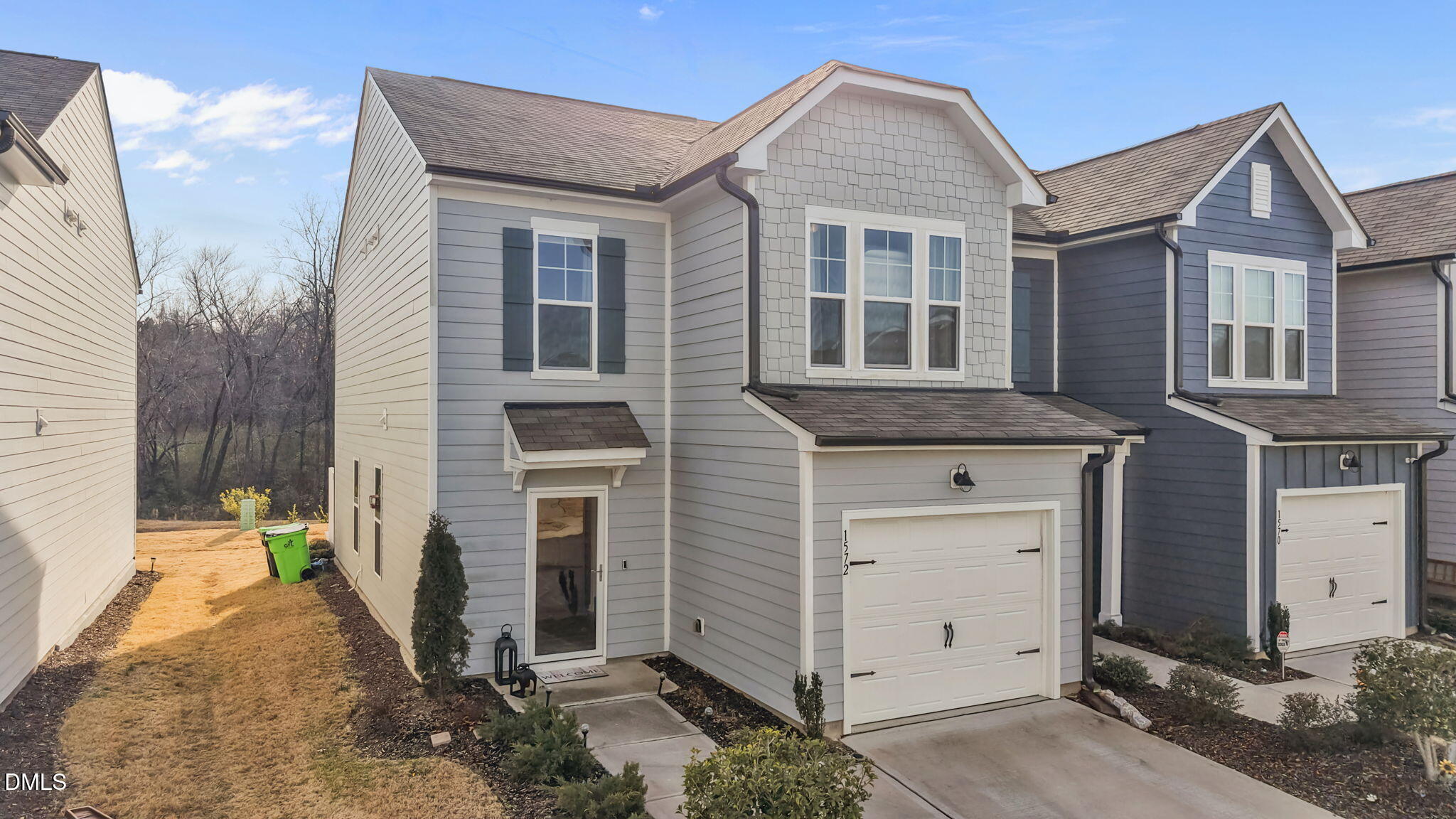 1572 Rhodes Pond Street Wendell, NC 27591 - Photo 2 of 44 a view of a brick house with a large windows