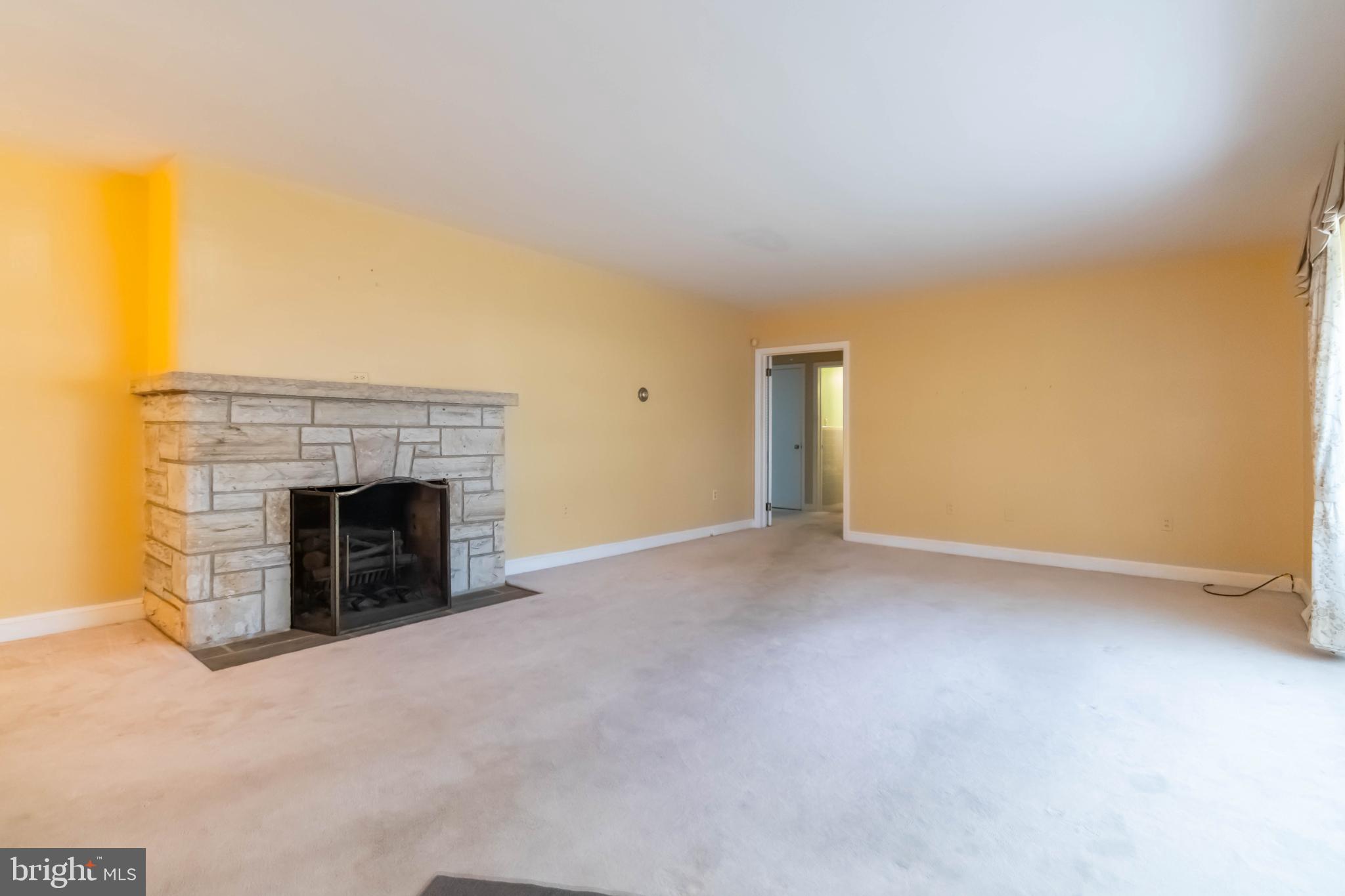 804 Highland Avenue Gettysburg, PA 17325 - Photo 11 of 27 Spacious room with a charming fireplace.