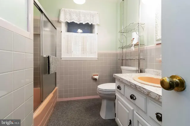 a bathroom with a sink and toilet