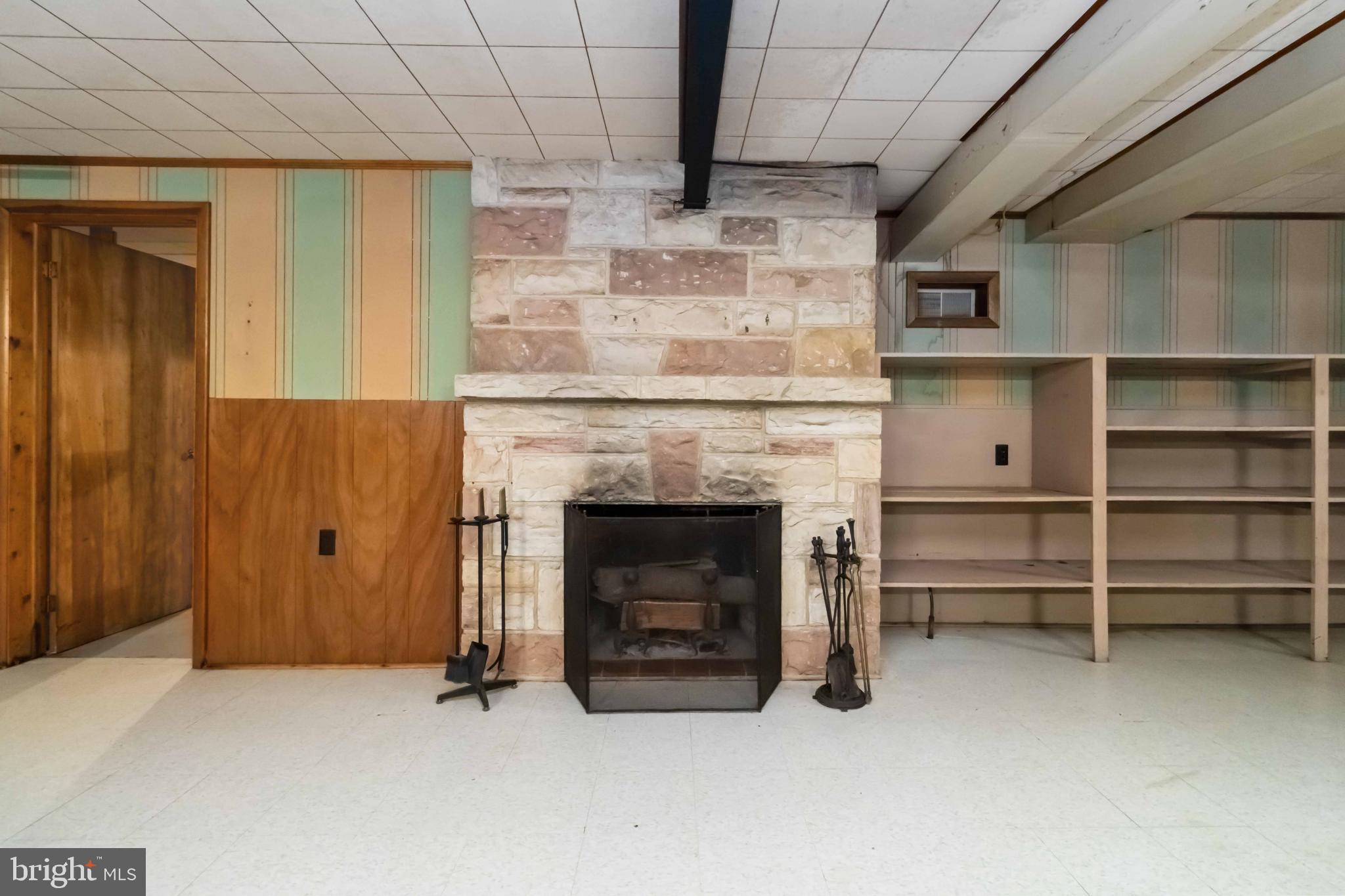 804 Highland Avenue Gettysburg, PA 17325 - Photo 24 of 27 Cozy fireplace in a vintage-inspired space.