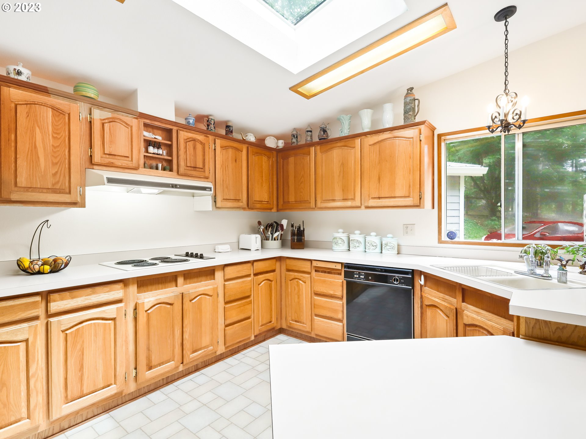 25875 South Morgan Road Estacada, OR 97023 - Photo 14 of 36 a large kitchen with stainless steel appliances granite countertop a sink and cabinets