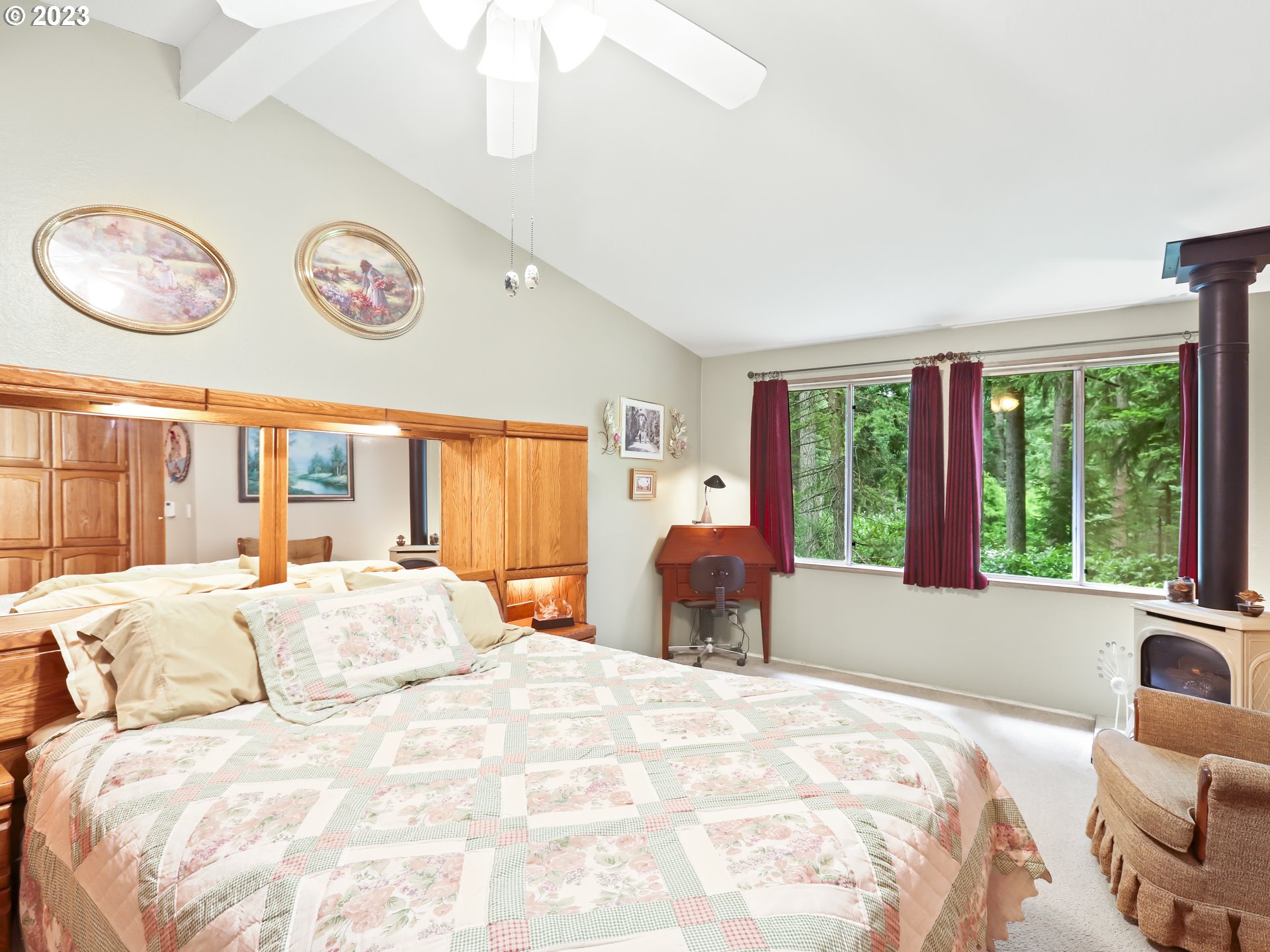 25875 South Morgan Road Estacada, OR 97023 - Photo 17 of 36 a bedroom with a bed and a large window