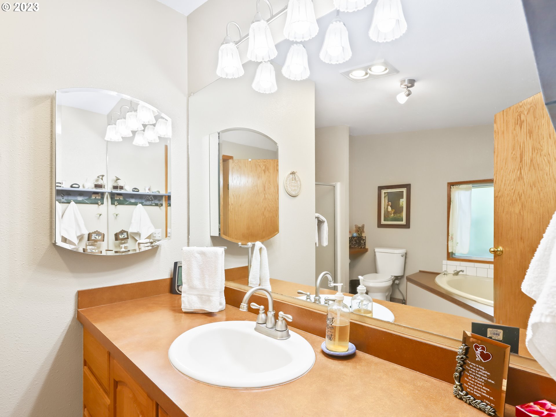 25875 South Morgan Road Estacada, OR 97023 - Photo 18 of 36 a bathroom with a sink vanity and mirror