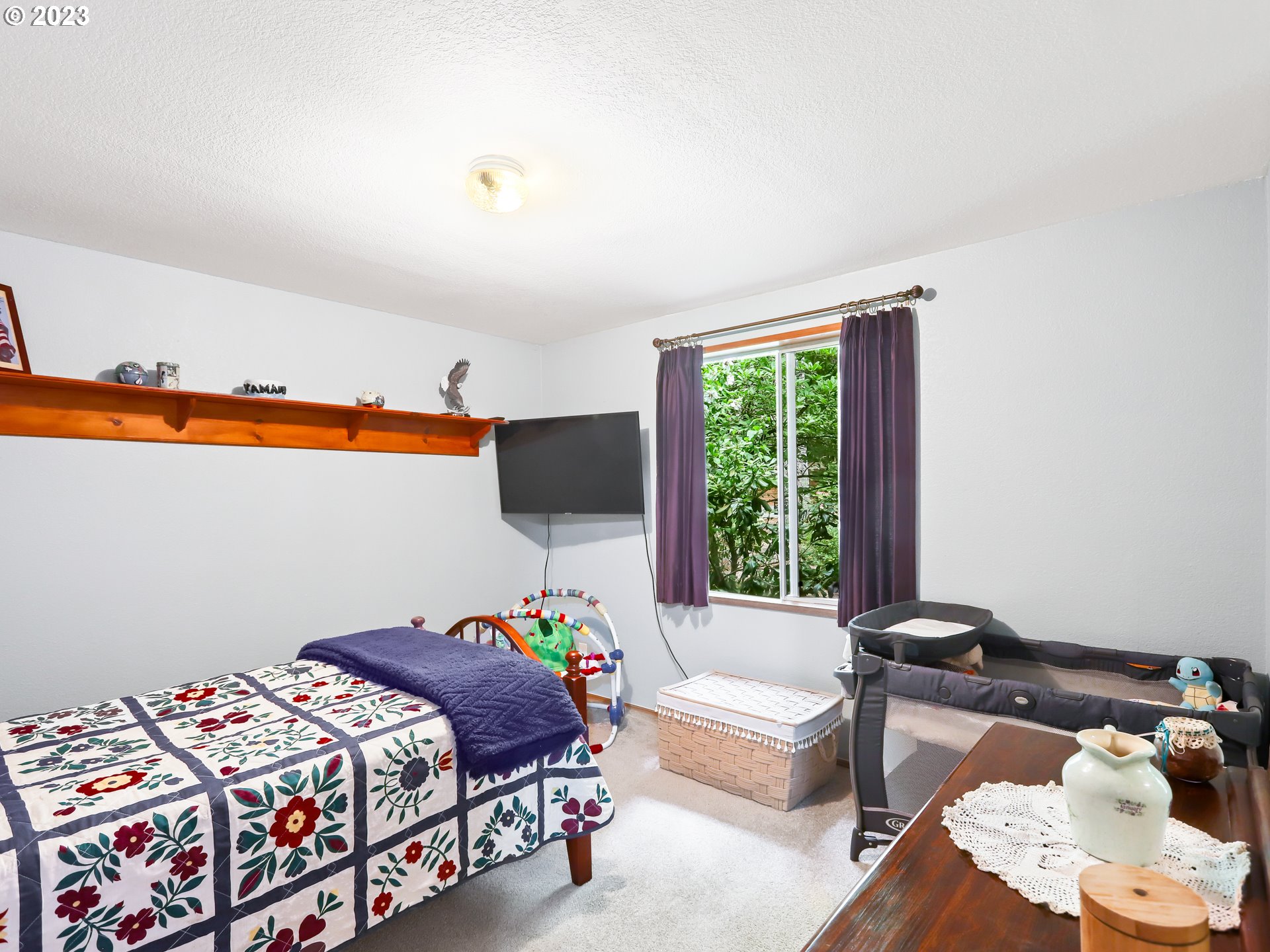 25875 South Morgan Road Estacada, OR 97023 - Photo 20 of 36 a bedroom with a bed and a window