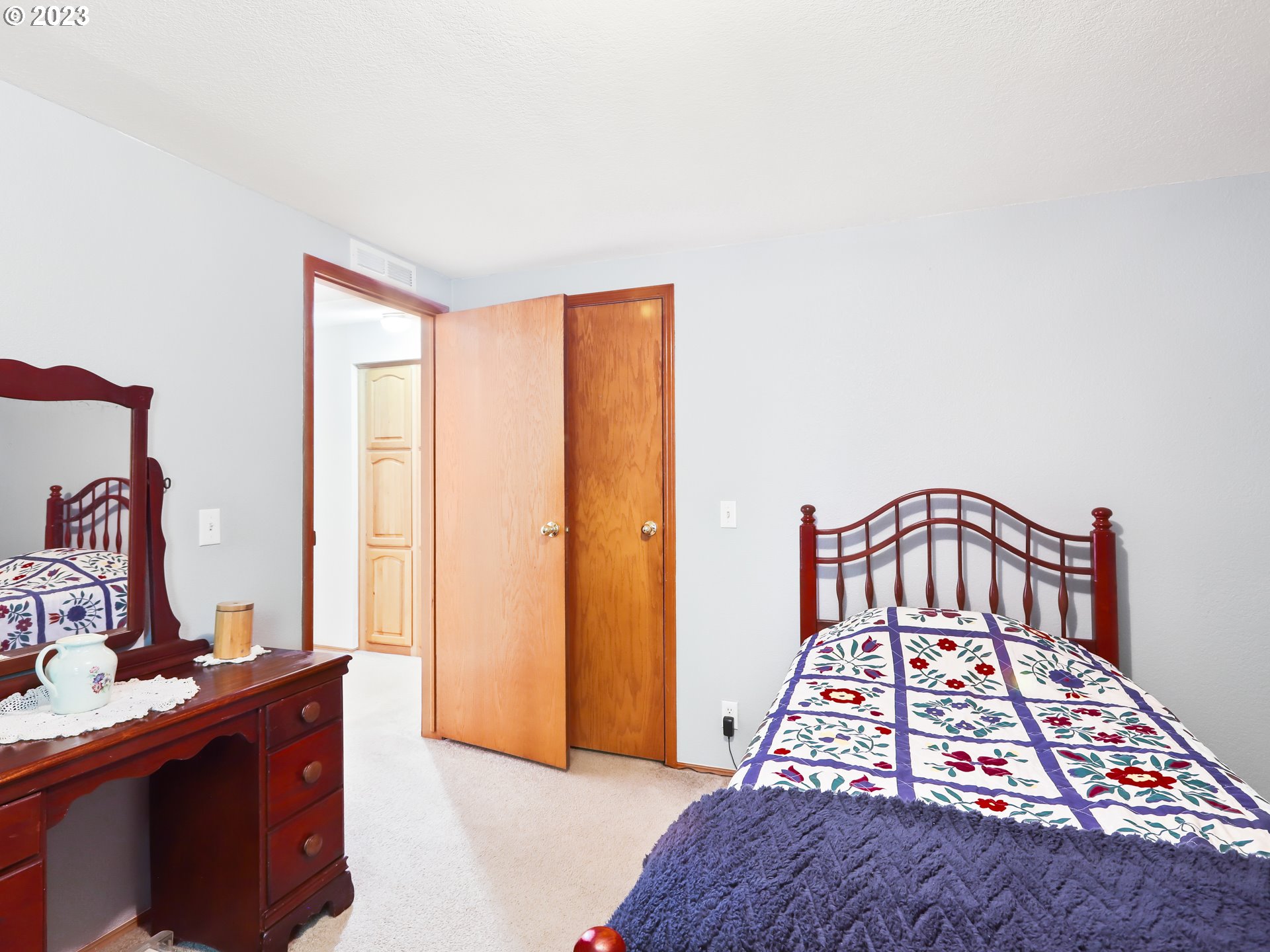 25875 South Morgan Road Estacada, OR 97023 - Photo 21 of 36 a bedroom with a bed and a dresser