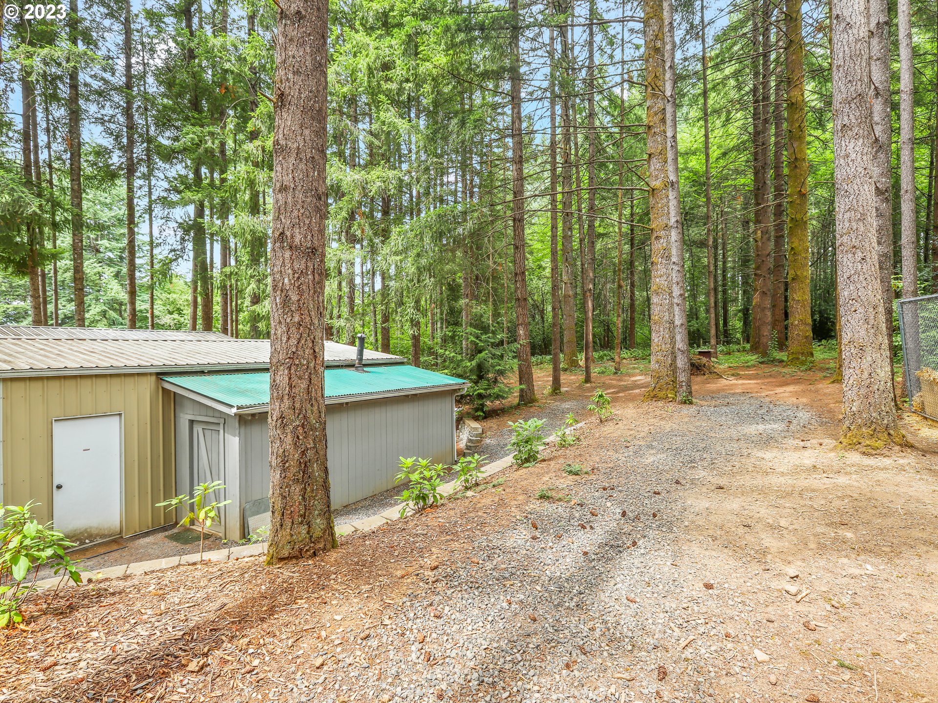 25875 South Morgan Road Estacada, OR 97023 - Photo 35 of 36 a house with trees in front of it
