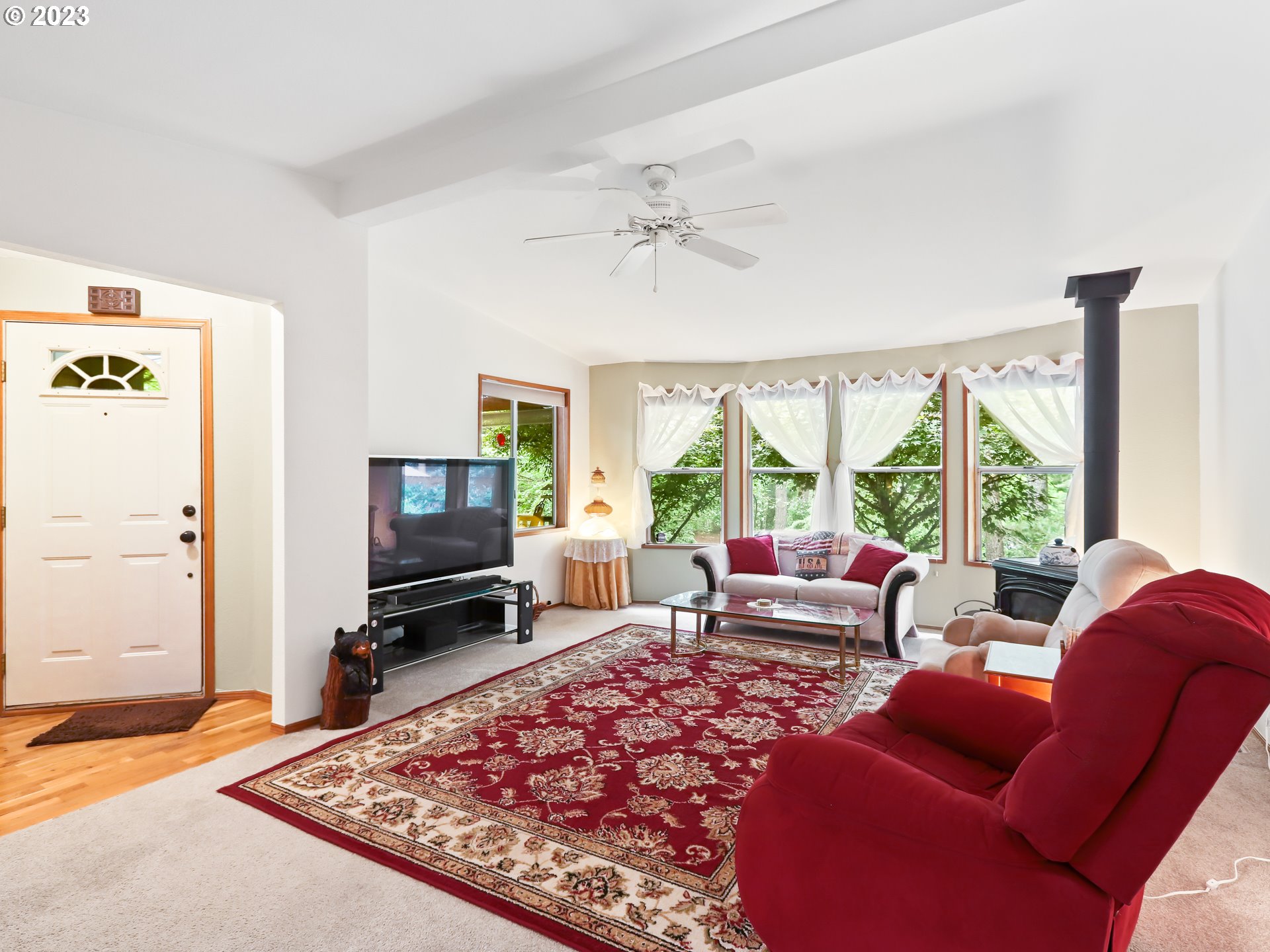 25875 South Morgan Road Estacada, OR 97023 - Photo 6 of 36 a living room with furniture and a flat screen tv