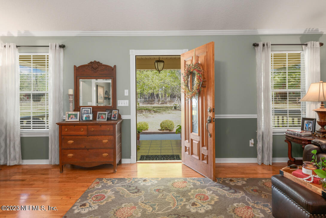 37491 Poole Road Hilliard, FL 32046 - Photo 16 of 39 a room with furniture and a window