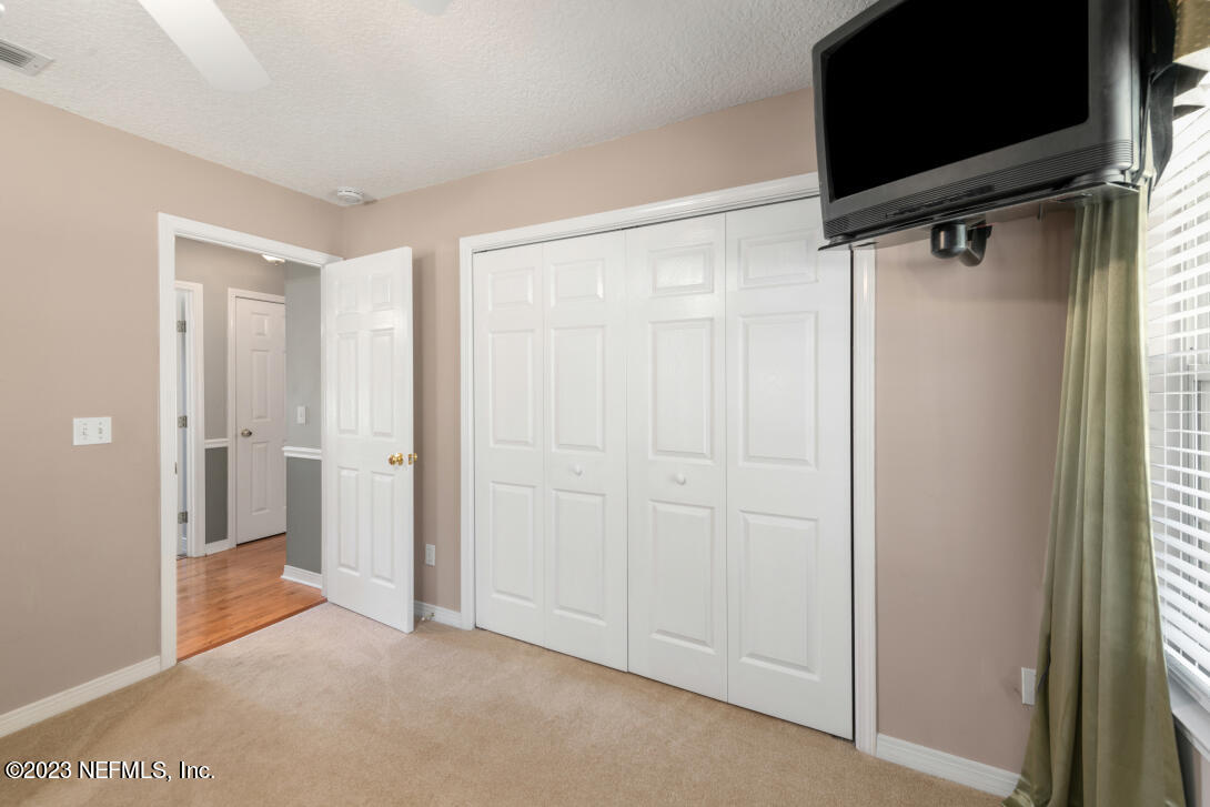 37491 Poole Road Hilliard, FL 32046 - Photo 35 of 39 a view of hallway with shower