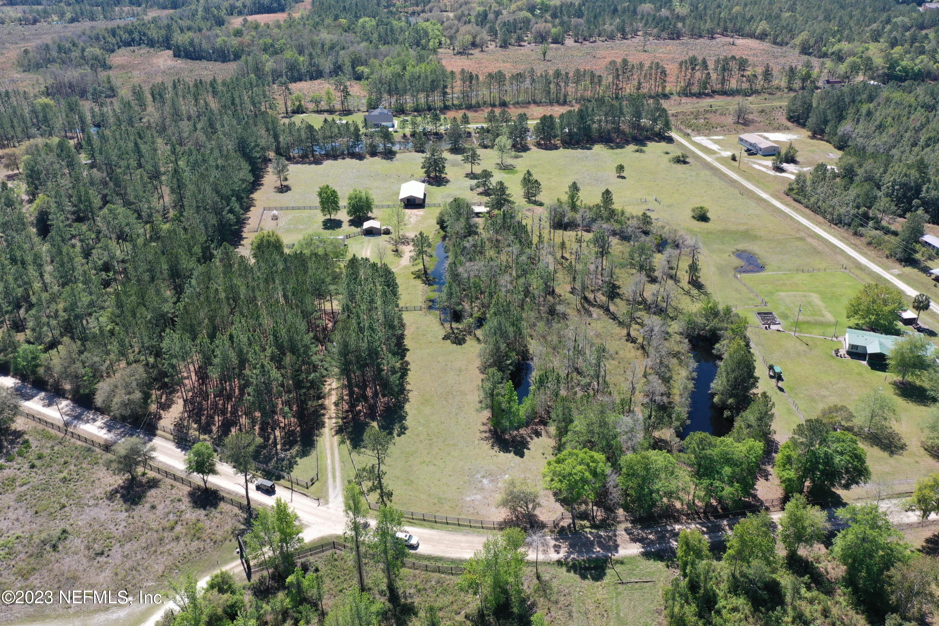 37491 Poole Road Hilliard, FL 32046 - Photo 4 of 39 an aerial view of multiple house