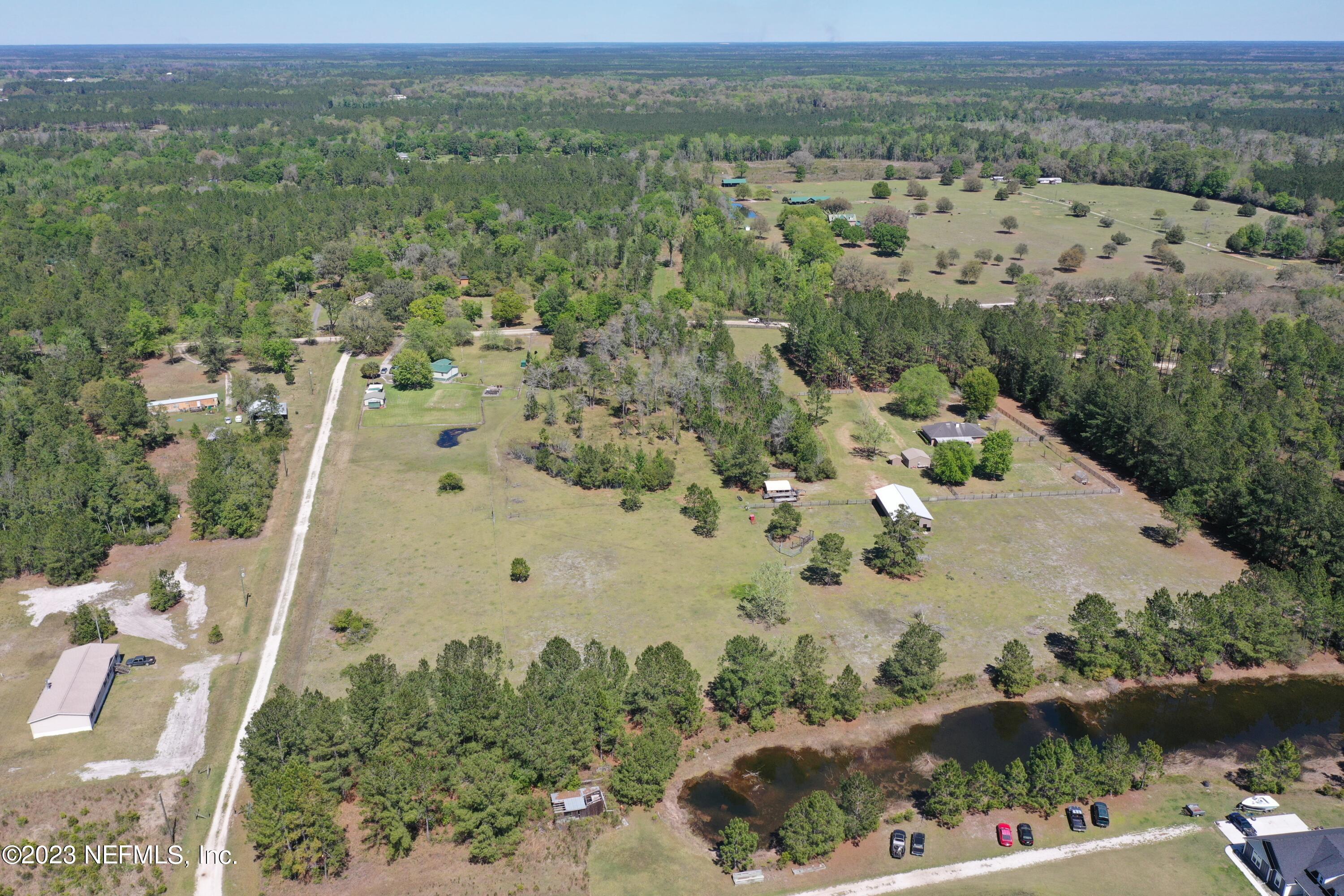 37491 Poole Road Hilliard, FL 32046 - Photo 6 of 39 an aerial view of a house with a yard