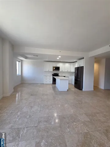 a view of a kitchen with a sink